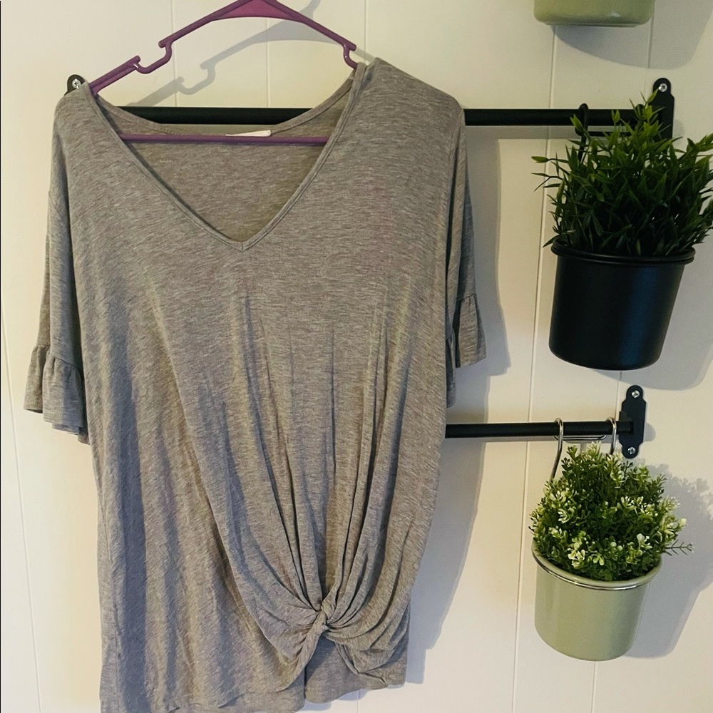 Grey flutter sleeve shirt with knot